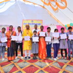JYLD Ideal Inter College varshikotsav 2026 mein annual function mein participate karne wale vidyarthiyon ko participation certificate diya gaya manch par